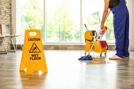 Professional commercial cleaning with wet floor safety at BTA Services